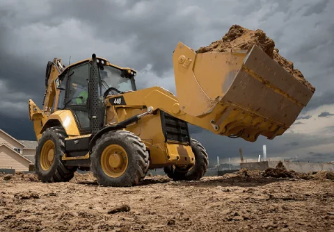 Экскаватор-погрузчик Cat 440 E